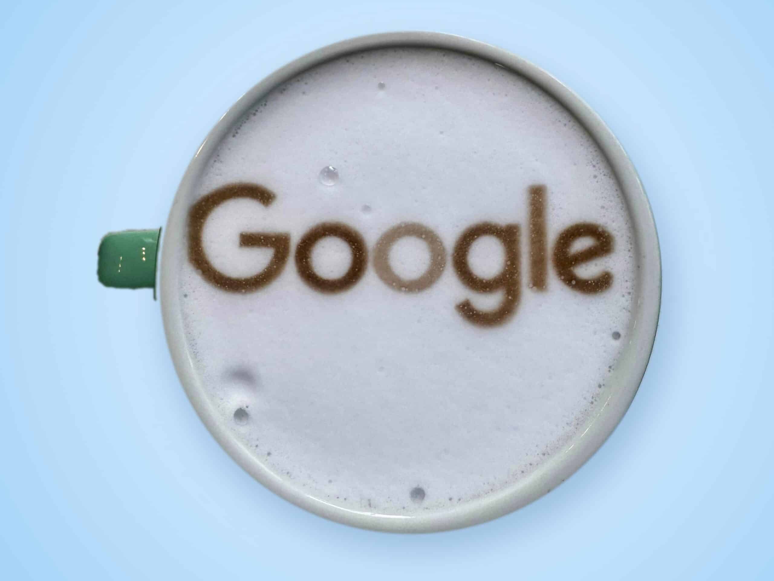 Google logo printed onto the milk foam of a latte by Tom’s Coffee